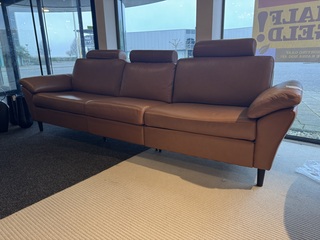 4-zits bank, cognac leder, elektrisch verstelbare relaxfunctie, zwarte